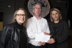 Declan Kilkelly, Hogs Heaven present a cheuqe to Candle of Grace